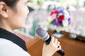 Asian female host speaking with microphone voice speaker in seminar room,talk conference in educational,woman or teacher is