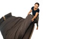 Asian female maid making bed in hotel room. Housekeeper Making Bed on white background with clipping path. Royalty Free Stock Photo