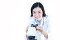Asian female medical technologist with microscope