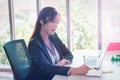 Female Operator is answering the phone for customer service sale and business consultant Royalty Free Stock Photo