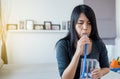 Asian woman patients using incentivespirometer or three balls for deep patient breathing Royalty Free Stock Photo