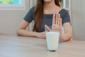 Asian female resistance deny drinking milk, symptom lactose allergy, concept of health problem, stop milk type drink, women