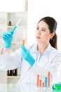 Asian female scientist Braving new medical frontiers Royalty Free Stock Photo