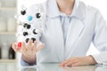 Asian female scientist teacher point at molecular model explain Royalty Free Stock Photo