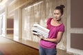Asian female student carry a lot of books Royalty Free Stock Photo