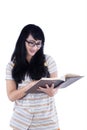 Asian female student reading book Royalty Free Stock Photo