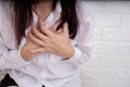 Asian female suffering from severe chest pain Royalty Free Stock Photo