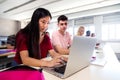 Asian female teen high school student using laptop in class. Education. Back to school. Royalty Free Stock Photo