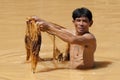 Asian fisherman with throw net Royalty Free Stock Photo