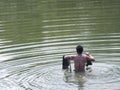 Asian fisherman with throw net. Royalty Free Stock Photo