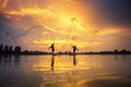 Asian Fishermen on boat fishing at lake