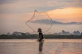 Asian fishermen set sail for fishing on the Mekong River