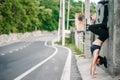 Asian fitness woman runner stretching legs and high posture after run Royalty Free Stock Photo