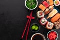 Asian food composition on black background, top view, copy space