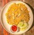 Asian Food, Crab Fired Rice Khao Phat Pu in white plate on wooden table background