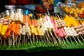 Asian food. Different mini barbecue counter at night street food market Royalty Free Stock Photo
