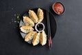 Asian food Gyoza or Jiaozi fried dumplings