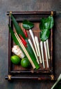 Asian food ingredients. Thai herbs and spices for thai cuisine on autentic thai tray, top view