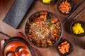 Asian food. korean cuisine. Top view spicy korean noodles with kimchi set and seafood with vegetables. Traditional korean cuisine Royalty Free Stock Photo