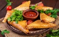 Asian food. Samsa samosas with chicken fillet and cheese