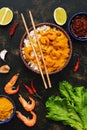 Asian food, shrimp in curry sauce with rice on a dark background. Royalty Free Stock Photo