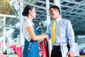 Asian foreman in textile factory giving training Royalty Free Stock Photo