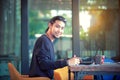 Asian freelance man working on computer laptop toothy smiling fa