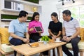 Asian Freelances hold tablet