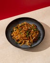 Asian fried kwetiaw served with beef topping Royalty Free Stock Photo