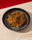 Asian fried kwetiaw served with beef topping Royalty Free Stock Photo