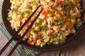 Asian fried rice with corn and eggs close-up horizontal top view Royalty Free Stock Photo