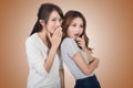 Asian friends' whisper Royalty Free Stock Photo