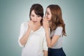 Asian friends' whisper Royalty Free Stock Photo