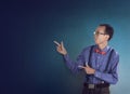 Asian funny guy pointing something Royalty Free Stock Photo