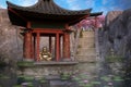 Asian garden with golden Buddha statue sitting inside a pagoda in the middle of a pond. 3d illustration