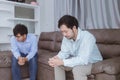 Asian gay couples are quarreling, angry or sad on sofa in home, LGBTQ concept.