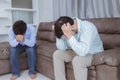 Asian gay couples are quarreling, angry or sad on sofa in home, LGBTQ concept.