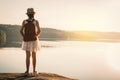 Asian girl backpack in nature during sunset