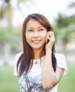 Asian girl calling with mobile phone