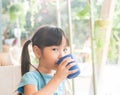 Asian girl child drink some water