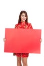 Asian girl in chinese cheongsam dress with red blank sign Royalty Free Stock Photo