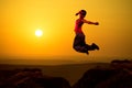 Asian girl dancing in sunrise Royalty Free Stock Photo