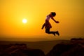 Asian girl dancing in sunrise Royalty Free Stock Photo