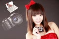 Asian girl with digital camera Royalty Free Stock Photo