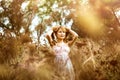 Asian girl in dress in field Royalty Free Stock Photo