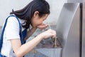 Asian girl drinking water Royalty Free Stock Photo