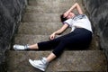 Asian girl fallen down steps Royalty Free Stock Photo