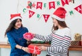 Asian girl friends wear santa hat in merry christmas party and e Royalty Free Stock Photo