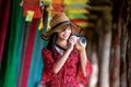 Asian girl fun and play in Lamduan woven cloth coffee shop Royalty Free Stock Photo