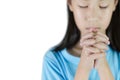 Asian girl hand praying isolated on white background,Hands folded in prayer concept for faith,spirituality and religion Royalty Free Stock Photo